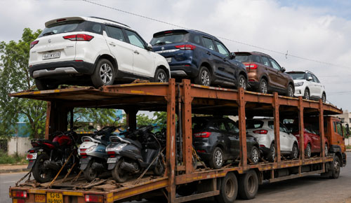 Car and bike transport using carrier truck